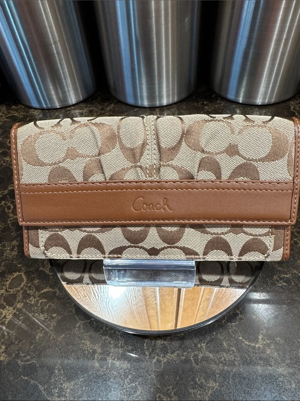 Coach Tan Signature “C” Canvas trifold Wallet with Brown Leather Trim embossed